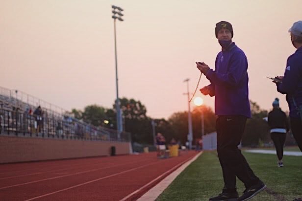 Assistant Cross Country coach Johnson takes times for his athletes at the Kirksville virtual meet September 19th