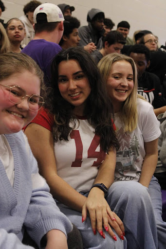 Penelope Heidy (12, center) smiles with friends. Picture via Penelope Heidy.