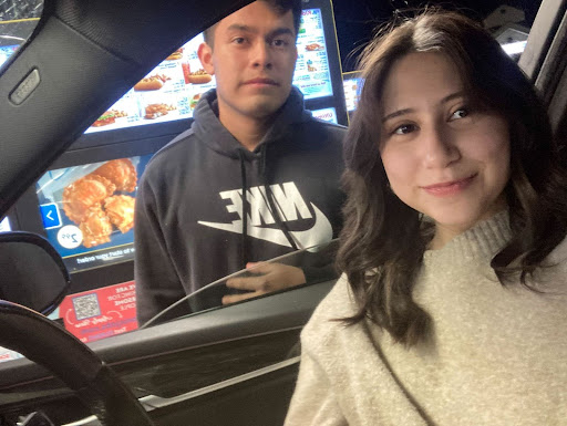 Angela De La Paz (12) poses with Chris Perez (12) after he eliminated her in Senior Assassin.
