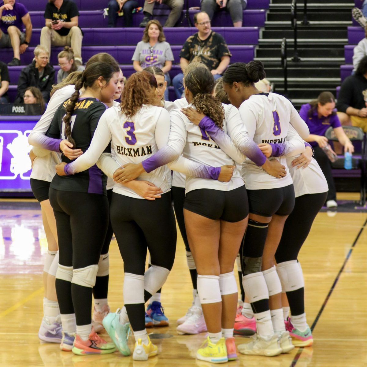 Hickman volleyball team in a huddle during their loss on Tuesday to Jefferson City
