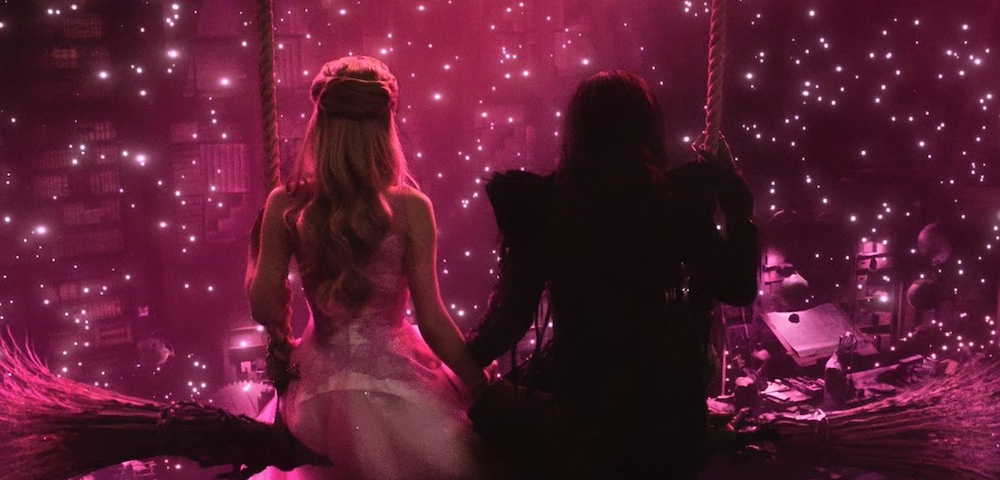 Elphaba (Cynthia Erivo) and Glinda (Ariana Grande) sit side by side during the song Wonderful.