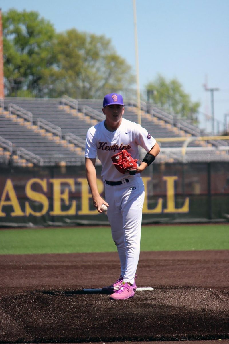 Micah McArthur (12) prepares for his next pitch against Blair Oaks as he attempts to tie the save record for Hickman High School (Photo provided by Micah McArthur)